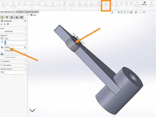 Choose to make an Extruded Cut.  Rotate your view to confirm the direction is correct.  Set the cut depth to 2.5 mm.  See the final example image here.