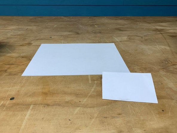 Get a piece of printer paper, and fold it in half three times (so it is 8 pieces thick)