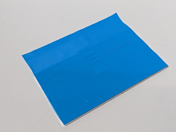 Assure the heatsink is clean and dry. Place a strip of thermal tape over the entirety of one side of the heatsink.