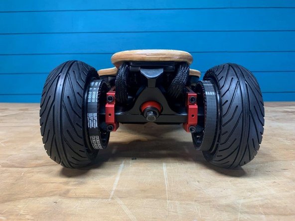 Repeat steps 2-8 to install a wheel (+ pulley) on the other side of the truck