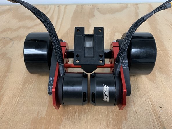 Repeat steps 18-20 to complete assembly of the other side of the drivetrain. Ensure proper belt tension