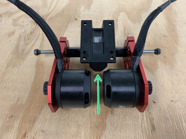 Slide the motor mounts onto the rear truck