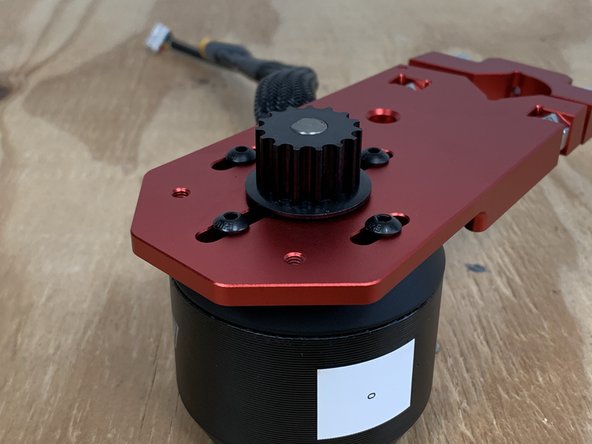 Place the motor pulley onto the motor shaft