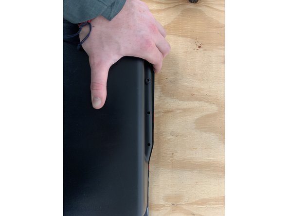 Align the enclosure over the deck's bolt holes, note that these holes are threaded.   Prepare the enclosure bolts. Add a metal washer and rubber washer to each bolt. The order of parts when assembled should be bolt, metal washer, rubber washer, enclosure. Add a drop of loctite to each bolt!