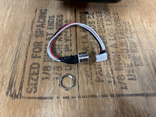 Remove the locknut from the switch