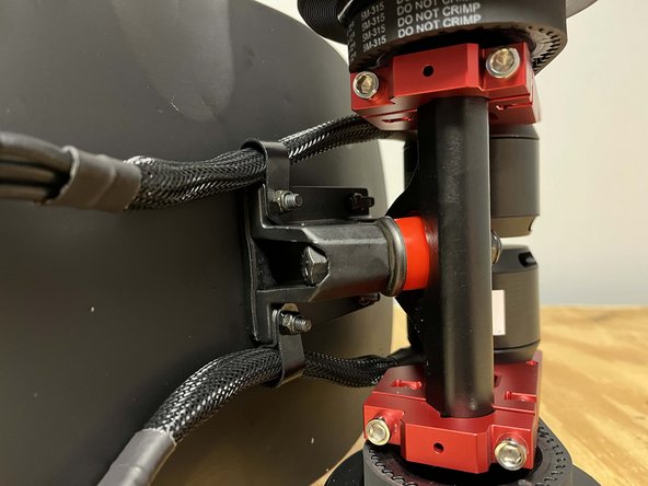 Secure the drivetrain to the deck using 4x locknuts
