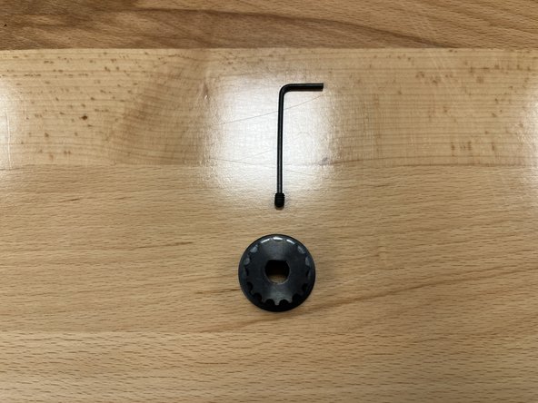 Remove the set screw from the motor pulley using the smaller 2mm Allen Wrench