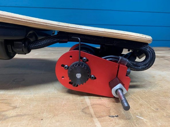 Tighten the set screw to secure the motor pulley