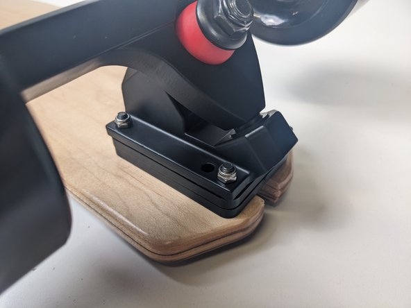 These bolts need to be secure, but not tight to the point where they are compressing the riser(s)