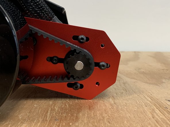 Repeat steps 18-20 to complete assembly of the other side of the drivetrain. Ensure proper belt tension