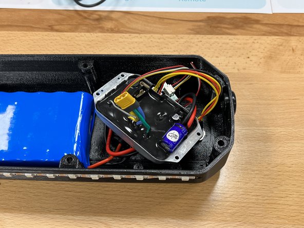 Now its time to connect the motor! Place the light controller into the bottom of the enclosure and then place the ESC inside the enclosure as shown
