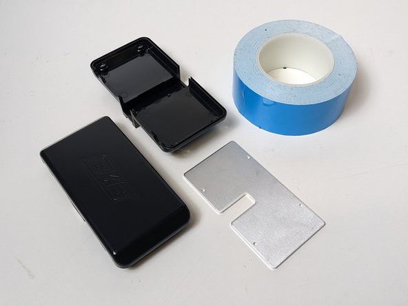 Grab your ESC Enclosure (Top &amp; Bottom), Metal Heatsink, and Thermal Tape.