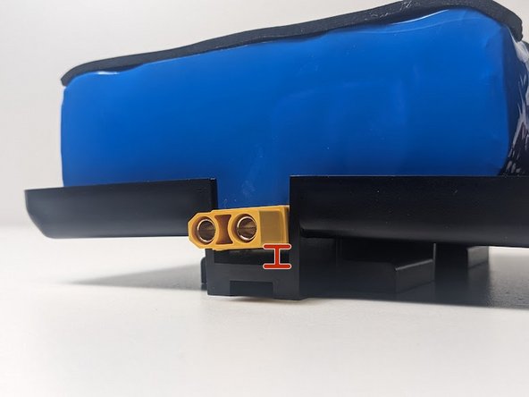 Ensure that the PCB is seated securely on these pegs. The second image demonstrates the correct fitment