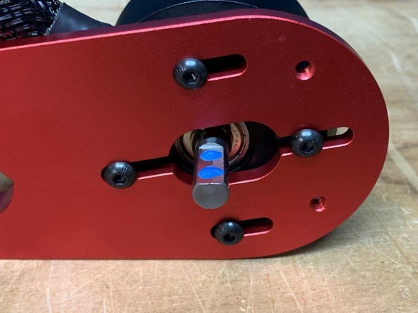 Add 2 drops of Loctite to the motor shaft