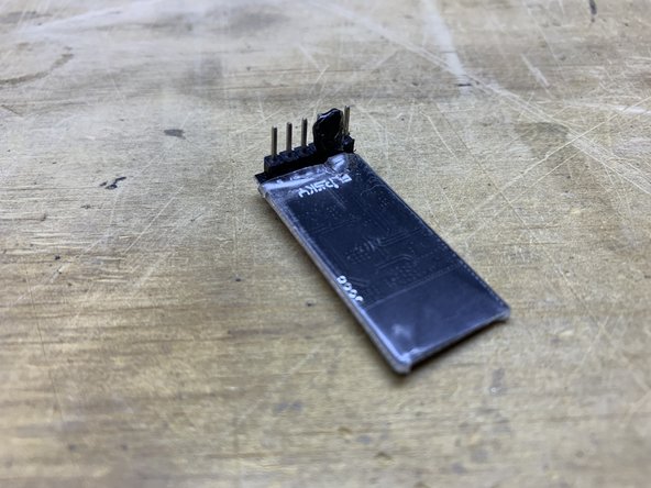 Carefully remove the black glue, and then remove the 3pin connector