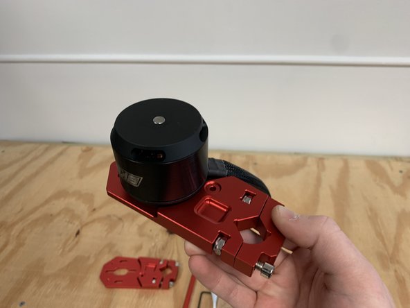 Place the motor mount on top of the motor with the wires oriented as shown