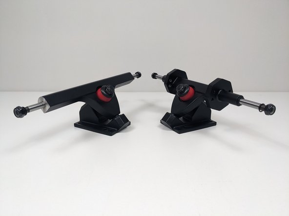 The rear hanger is uni-directional and must be attached with the holes as in the picture