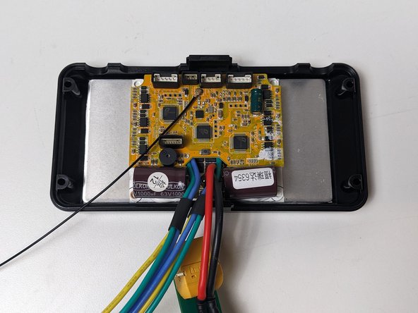 Align the ESC with the Heatsink. Your cables should be sprouting from the enclosure side with NO CABLE PORTS. Your capacitors should not be near the openings of the enclosure.