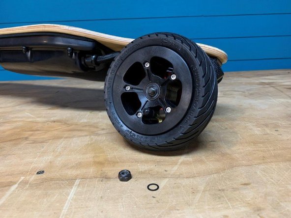 Remove the locknut and one washer