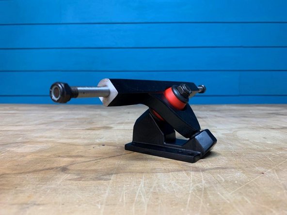 Place the bushing and washer back on and tighten the locknut