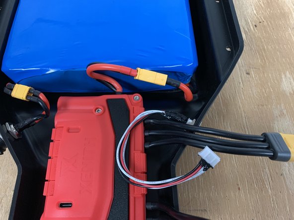 Plugin the battery to the Xenith