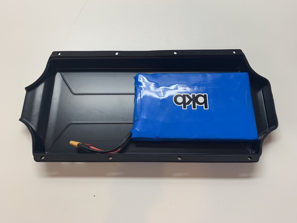 It does not matter what side of the battery the velcro is placed on