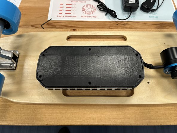 Add the enclosure lid to the enclosure, the logo should be up (if there is one on the lid)