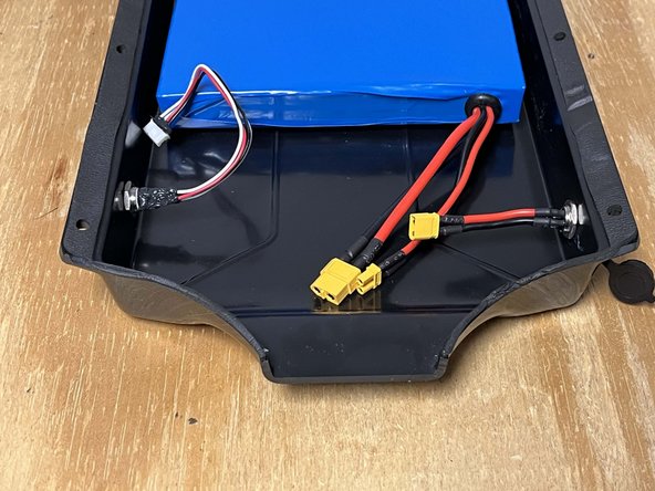 Place it through the hole in the enclosure and secure it with the locknut