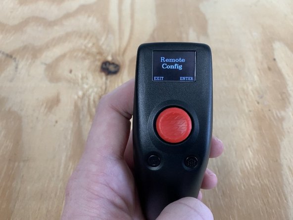 Then click EXIT to return to the main menu. Navigate to the REMOTE CONFIG menu. Press ENTER