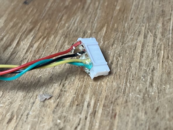 Add hot glue to the connector that plugs into the VESC