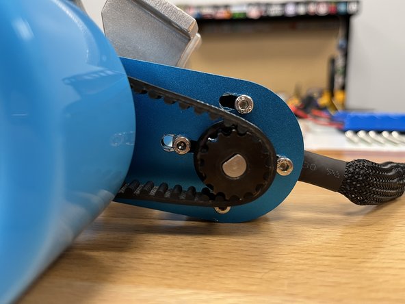 You can then let go of the motor and tighten the other 3 bolts