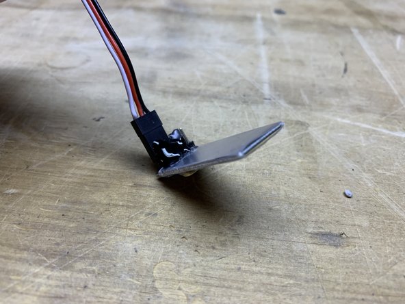 Secure it with some kind of adhseive/glue