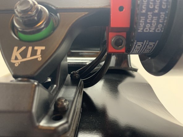 Align the motor wires so they go through the cable shroud