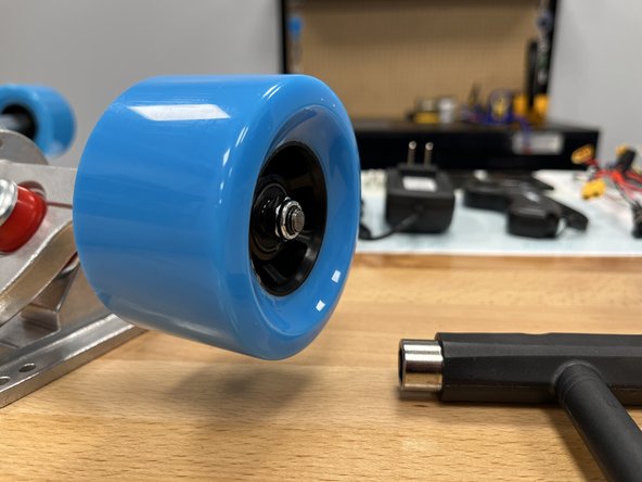 Place the locknut onto the hanger and tighten using the T-Tool