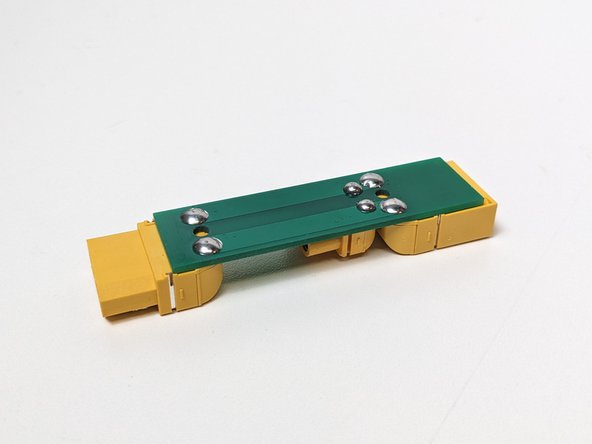 Align your plugs to be flush and parallel with the PCB. With the male connector on the shorter end and the female closest to your XT60 connector.