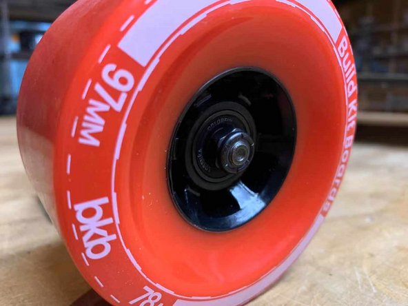 Secure the wheel with a washer and locknut