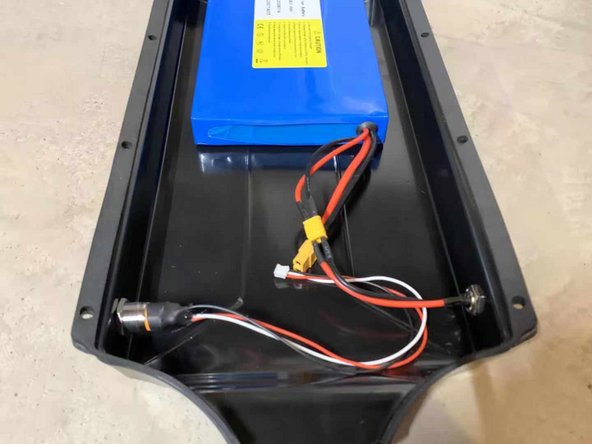 Install them in the enclosure and secure with the locknuts you just removed.