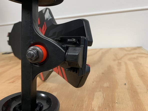 Add a riser to the underside of the deck over the bolts