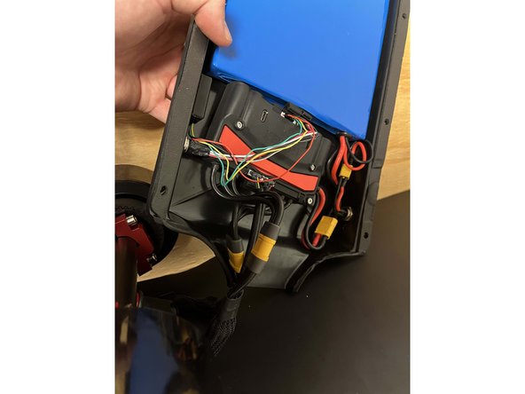 Plug the lower motor into the right side of the Xenith. Connect the large Yellow connectors and then plugin the white connector into the SENSOR 2 port