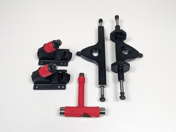 Gather the truck baseplates, truck hangers, and T-Tool