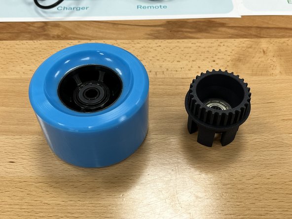 Gather the wheel pulley from section 3 and the wheel from section 1