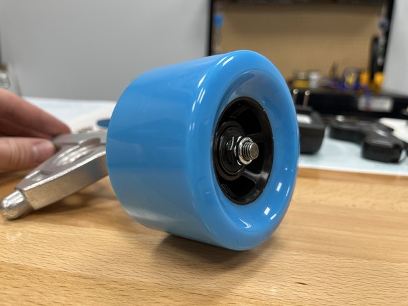 Place the locknut onto the hanger and tighten using the T-Tool