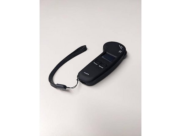 Turn the board on by either rolling the wheels or pressing the power button.