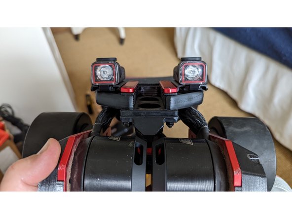 Install tail light mounts above the board, and below the aluminum mount points.