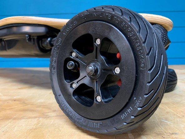 Secure the wheel with a washer and locknut