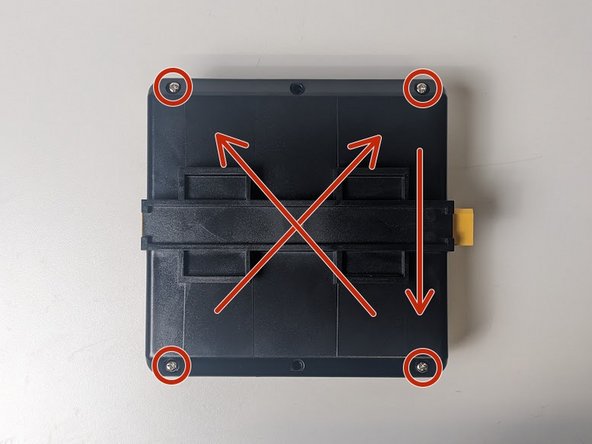 Place four screws from the bottom of the case and tighten halfway in the order shown