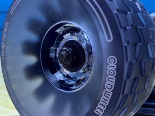 Remove one washer and one locknut with the T-Tool