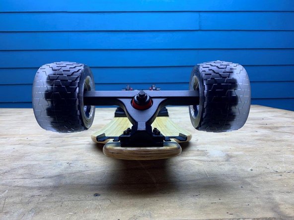 Slide the other wheel on with the white words facing outward