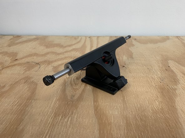 Remove one bushing and washer from each baseplate