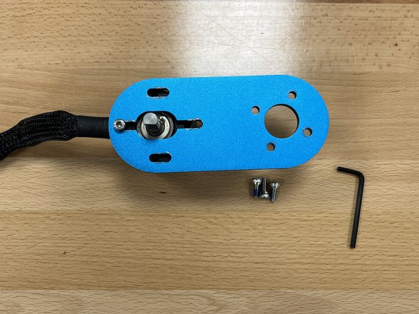 One side of the motor mount will have black lines on it. This side is the back, and is the correct side to install the motor on. The bolts will go on the OPPOSITE side.